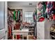 Organized walk-in closet with a window, clothing racks, shelves, and center storage island at 3613 Pitchers Pl., Little River, SC 29566