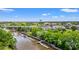 Scenic aerial view showcasing the river, bridges, and docks, highlighting the town's waterfront charm at 364 Hayloft Circle, Conway, SC 29526