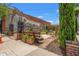 Serene courtyard with a painted train mural, seating area, and greenery, creating a relaxing outdoor oasis at 364 Hayloft Circle, Conway, SC 29526