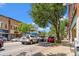 Charming street view featuring parked cars and a variety of storefronts along the tree-lined street at 364 Hayloft Circle, Conway, SC 29526