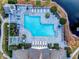 Aerial view of the community pool, lounge area, and landscaping around the perimeter at 3741 Block House Way # 736, Myrtle Beach, SC 29577
