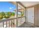 Balcony offers views of lush trees, a body of water, and a nearby parking area at 3741 Block House Way # 736, Myrtle Beach, SC 29577