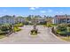 Community entrance featuring meticulously manicured landscaping and well-maintained gated access at 3741 Block House Way # 736, Myrtle Beach, SC 29577