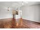 Bright living room boasts hard floors, neutral walls, and chandelier lighting at 3741 Block House Way # 736, Myrtle Beach, SC 29577