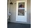 Charming entryway with door and hanging decorations at 4396 Baldwin Ave. # C-24, Little River, SC 29566