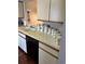 Well-organized kitchen with white cabinets and ample counter space at 4396 Baldwin Ave. # C-24, Little River, SC 29566