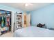 Bright bedroom with closet, ceiling fan, and doorway to the rest of the home at 4409 Eastport Blvd. # E2, Little River, SC 29566