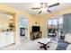 Cozy living room featuring a sofa, television, and sliding glass doors leading to a deck at 4409 Eastport Blvd. # E2, Little River, SC 29566