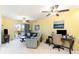Cozy living room with a sliding glass door to a private balcony providing ample natural light at 4409 Eastport Blvd. # E2, Little River, SC 29566