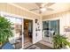 Screened porch with sliding glass doors leading to the home's interior at 4409 Eastport Blvd. # E2, Little River, SC 29566