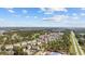 Expansive aerial view of condo community near lush golf course and highway at 4679 Wild Iris Dr. # 103, Myrtle Beach, SC 29577