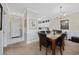Open-concept design with dining area flowing into the living room and entryway at 4679 Wild Iris Dr. # 103, Myrtle Beach, SC 29577