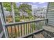 Charming balcony view of a community courtyard with garden areas and condo buildings at 5905 South Kings Hwy. # 4202, Myrtle Beach, SC 29575