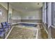 Indoor hot tub surrounded by tiled floors, large windows, and comfortable seating at 5905 South Kings Hwy. # 4202, Myrtle Beach, SC 29575