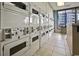 On-site laundry room provides convenient access to many washers and dryers for residents at 5905 South Kings Hwy. # 4202, Myrtle Beach, SC 29575