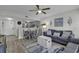 Cozy living room featuring modern furnishings, a ceiling fan, and access to kitchen and dining area at 5905 South Kings Hwy. # 4202, Myrtle Beach, SC 29575