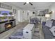 Inviting living room featuring a faux fireplace, wood floors and a nautical theme at 5905 South Kings Hwy. # 4202, Myrtle Beach, SC 29575