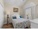 Cozy bedroom with vaulted ceilings, white furniture, and blue accents at 621 Banks Dr. # 12-1, Myrtle Beach, SC 29588