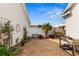 Paver patio features swing, colorful garden and landscaping at 621 Banks Dr. # 12-1, Myrtle Beach, SC 29588