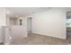 Upstairs hallway with carpet flooring leading to bedrooms at 71 Ashworth Dr., Tabor City, NC 28463