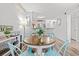 Comfortable dining area featuring a wooden table with seating, seamlessly blending with the kitchen at 720 North Waccamaw Dr. # 312, Murrells Inlet, SC 29576