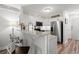 Bright kitchen with granite countertops, stainless steel appliances, and white cabinets at 720 North Waccamaw Dr. # 312, Murrells Inlet, SC 29576