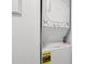 Stacked laundry appliances in unit, showing modern washer/dryer at 720 North Waccamaw Dr. # 312, Murrells Inlet, SC 29576
