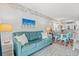 Inviting living room featuring a comfortable sofa, soft lighting, and stylish decor at 720 North Waccamaw Dr. # 312, Murrells Inlet, SC 29576