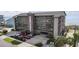 Multi-story condo with balconies and covered parking near the beach and landscaping at 811 N Ocean Blvd. # 401, Surfside Beach, SC 29575
