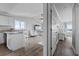 Open floor plan featuring updated kitchen with living and dining area boasting ocean views at 811 N Ocean Blvd. # 401, Surfside Beach, SC 29575