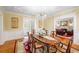 Elegant dining room featuring a classic wood table, decorative rug, and chandelier at 817 Evans Rd., Marion, SC 29571