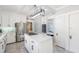 Stylish kitchen boasts stainless steel appliances, white cabinetry, and a functional center island at 817 Evans Rd., Marion, SC 29571