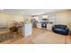 Cozy kitchen with modern stainless steel appliances, light wood floors, and a charming breakfast bar at 817 Evans Rd., Marion, SC 29571
