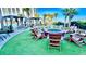 Outdoor space featuring a cozy fire pit and comfortable lounge chairs at 8560 Queensway Blvd. # 304, Myrtle Beach, SC 29572