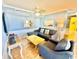 Inviting living room featuring comfortable seating, TV, and beach-themed decor at 8560 Queensway Blvd. # 304, Myrtle Beach, SC 29572
