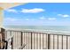 Relaxing balcony view overlooking sandy beach and ocean waters at 9400 Shore Dr. # 725, Myrtle Beach, SC 29572