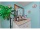 Coastal-themed vanity, complementing a unique condo design and aesthetic at 9400 Shore Dr. # 725, Myrtle Beach, SC 29572