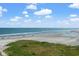 Picturesque beach scene with ocean views and grassy dunes at 9400 Shore Dr. # 725, Myrtle Beach, SC 29572