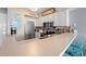 Well-lit kitchen featuring stainless steel appliances and a breakfast bar with seating at 9400 Shore Dr. # 725, Myrtle Beach, SC 29572