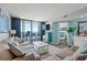 Cozy living room with ocean view, and sliding door to private balcony at 9400 Shore Dr. # 725, Myrtle Beach, SC 29572