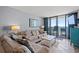 Comfortable living room with ocean view, perfect for relaxing and enjoying beachside living at 9400 Shore Dr. # 725, Myrtle Beach, SC 29572