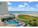 Resort pool area with beach access at Sands Beach Club at 9400 Shore Dr. # 725, Myrtle Beach, SC 29572