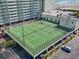 Aerial view of community tennis courts over parking garage at 9400 Shore Dr. # 725, Myrtle Beach, SC 29572