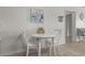 Charming dining area with seating for two, bathed in natural light from a nearby window at 9620 Shore Dr. # 307, Myrtle Beach, SC 29572