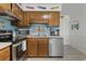 Well-equipped kitchen with stainless steel appliances and ample cabinet space, perfect for cooking at 9620 Shore Dr. # 307, Myrtle Beach, SC 29572