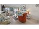 Bright living room filled with comfortable seating and decorative accents, leading to a balcony at 9620 Shore Dr. # 307, Myrtle Beach, SC 29572