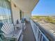 Relaxing balcony area featuring a lounge chair and standard seating with views of city at 9820 Queensway Blvd. # 607, Myrtle Beach, SC 29572