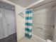 Standard bathroom featuring a shower-tub combination, a light blue shower curtain, and towel rack at 9820 Queensway Blvd. # 607, Myrtle Beach, SC 29572