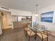 Open-concept dining area connected to the kitchen, perfect for entertaining at 9820 Queensway Blvd. # 607, Myrtle Beach, SC 29572
