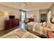Comfortable bedroom with two beds, dresser, and a window with plenty of natural light at 9994 Beach Club Dr. # 408, Myrtle Beach, SC 29572